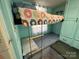 This is a lovely bedroom with bunkbeds for children, decorated in seafoam green at 104 Trestle Cir, New London, NC 28127