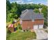 Spacious backyard shows outdoor deck and separate shed at 10836 Clark St, Davidson, NC 28036