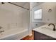 Clean bathroom featuring a tub/shower combination, vanity with sink, and plenty of space at 11000 White Stag Dr, Charlotte, NC 28269
