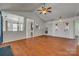 Bright, open living room with wood floors, vaulted ceilings, and lots of space at 11000 White Stag Dr, Charlotte, NC 28269