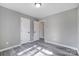 Cozy bedroom featuring neutral walls and modern vinyl plank flooring at 1107 Franklin Thomas Pl, Charlotte, NC 28214