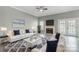 Modern living room with a fireplace, gray walls, and contemporary furniture at 1107 Franklin Thomas Pl, Charlotte, NC 28214