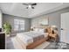 Serene main bedroom featuring neutral walls, vaulted ceiling, and a ceiling fan at 1107 Franklin Thomas Pl, Charlotte, NC 28214