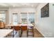 Bright dining area with a wooden table, stylish chairs, and plenty of natural light at 112 Abersham Dr, Mooresville, NC 28115