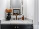 Elegant bathroom vanity with stylish mirror and fixtures at 11708 Huxley Rd, Charlotte, NC 28277