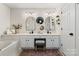 Large bathroom features a double vanity with a makeup counter and tub at 11708 Huxley Rd, Charlotte, NC 28277