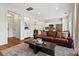 Spacious living room showcasing seamless flow into the modern kitchen at 11708 Huxley Rd, Charlotte, NC 28277