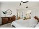 View of a main bedroom showing a closet door and wooden dresser at 11708 Huxley Rd, Charlotte, NC 28277