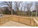 Backyard view from the new home with expansive views of the property and surrounding trees at 130A Springway Dr, Kannapolis, NC 28081