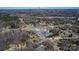 An aerial view shows a rural neighborhood with single-Gathering homes surrounded by trees, near the City of Charlotte at 133 Sutton S Rd, Fort Mill, SC 29708