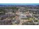 An aerial view shows a rural neighborhood with single-Gathering homes surrounded by trees, near HWY 160/I-77 at 133 Sutton S Rd, Fort Mill, SC 29708