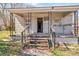 Exterior front porch view of home with wood stairs and iron railing at 133 Sutton S Rd, Fort Mill, SC 29708