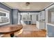 Partially updated kitchen featuring painted cabinets and a vintage ceiling light at 133 Sutton S Rd, Fort Mill, SC 29708