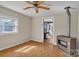 Comfortable living area with wood floors, a view through to the dining room, and natural light at 133 Sutton S Rd, Fort Mill, SC 29708