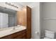 Bathroom features a vanity with cabinet storage, a bright mirror and a shower with tub at 13923 Singleleaf Ln, Charlotte, NC 28278