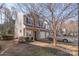 Inviting townhome with attached garage and multiple windows for abundant natural light at 13923 Singleleaf Ln, Charlotte, NC 28278