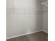 Walk-in closet features white wire shelving and neutral carpet at 13923 Singleleaf Ln, Charlotte, NC 28278