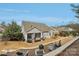 Aerial view of backyard featuring a covered patio, seating area, and a multi-tiered landscaped yard at 14621 Brannock Hills Dr, Charlotte, NC 28278