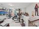 Finished basement with exercise equipment, stairs, and unique decor at 14621 Brannock Hills Dr, Charlotte, NC 28278