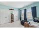 Bedroom with twin closets, window with drapes, and a black beanbag chair at 14621 Brannock Hills Dr, Charlotte, NC 28278