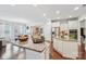 Open-concept kitchen featuring granite counters, stainless steel appliances, and hardwood floors at 14621 Brannock Hills Dr, Charlotte, NC 28278