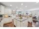 Spacious kitchen featuring granite countertops, stainless appliances, and a center island at 14621 Brannock Hills Dr, Charlotte, NC 28278