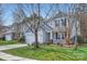 Charming home with a well-manicured lawn and inviting front porch at 1474 Callender Nw Ln, Charlotte, NC 28269