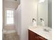 Bathroom featuring a vanity, mirror and combination shower and tub at 1512 Pecan Ave, Charlotte, NC 28205