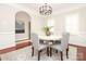 Elegant dining room with stylish chandelier and neutral tones at 1512 Pecan Ave, Charlotte, NC 28205