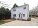 A charming two-story home with a welcoming front entrance with a white picket fence at 1512 Pecan Ave, Charlotte, NC 28205