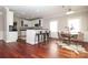 Spacious kitchen with white cabinetry, modern appliances, and a breakfast bar at 1512 Pecan Ave, Charlotte, NC 28205