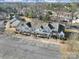 Aerial view of townhomes, manicured landscaping, and a parking lot at 1559 Maypine Commons Way, Rock Hill, SC 29732