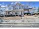 Charming townhome featuring a well-manicured lawn, sidewalk, and covered entryway to welcome you at 1559 Maypine Commons Way, Rock Hill, SC 29732