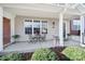 Welcoming front porch features space for seating, perfect for relaxing and enjoying the neighborhood at 1559 Maypine Commons Way, Rock Hill, SC 29732