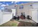 Back patio with a fenced-in yard, furniture, and sliding glass doors at 1559 Maypine Commons Way, Rock Hill, SC 29732