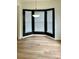 Bright dining area featuring a modern chandelier and bay window with white blinds at 1629 Backcreek Ln, Gastonia, NC 28054