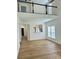 Open-concept living area featuring hardwood floors and abundant natural light at 1629 Backcreek Ln, Gastonia, NC 28054