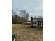 View of the home's backyard and the lot showing a storage shed in the back at 1640 Old Friendship Rd, Rock Hill, SC 29730