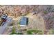 Aerial view shows the backyard, stone feature, and location close to the neighbor's property at 1740 Young Dr, Conover, NC 28613