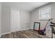 Spacious finished basement area featuring modern vinyl plank flooring and closet with bi-fold doors at 1740 Young Dr, Conover, NC 28613