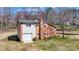 The two-story residence combines brick and vinyl siding, a garage, and a covered patio, offering ample outdoor space at 1740 Young Dr, Conover, NC 28613