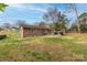 Spacious backyard featuring a well-maintained lawn, patio area with seating, mature trees and a fence at 198 33Rd Nw St, Hickory, NC 28601