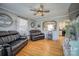 Inviting living room with fireplace, hardwood floors, and comfortable leather seating at 198 33Rd Nw St, Hickory, NC 28601