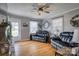 Open living room with hardwood floors, comfortable seating, and natural light at 198 33Rd Nw St, Hickory, NC 28601