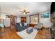 Bright living room with hardwood floors, ceiling fan, and window seat at 201 Wiley Ave, York, SC 29745