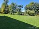 Beautiful view of the green and large backyard at 2108 Cranberry Woods Ct, Charlotte, NC 28208