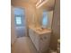 Bathroom featuring a double sink vanity and large mirror at 2108 Cranberry Woods Ct, Charlotte, NC 28208