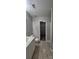 Bathroom with a neutral color scheme, a toilet, and a doorway to a walk-in closet at 2108 Cranberry Woods Ct, Charlotte, NC 28208