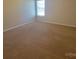 Carpeted bedroom with window at 2108 Cranberry Woods Ct, Charlotte, NC 28208