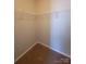 Walk-in closet featuring wire shelving at 2108 Cranberry Woods Ct, Charlotte, NC 28208